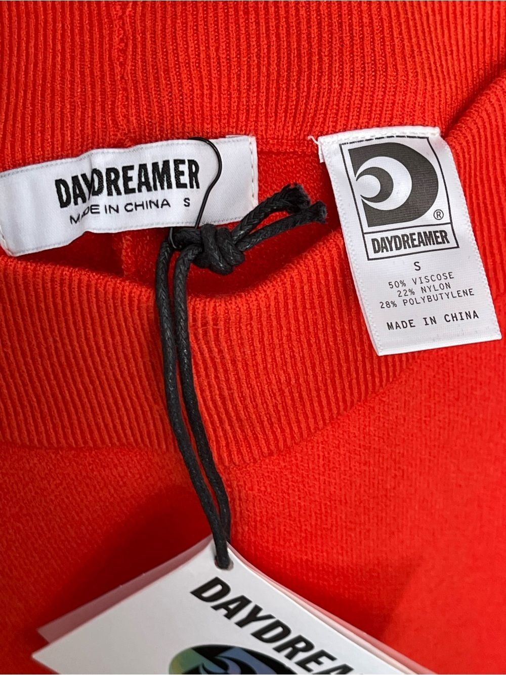Daydreamer flare knit pintuck pants in a vibrant hot orange color. New - Picture 9 of 9